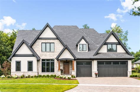 beige house with black trim.